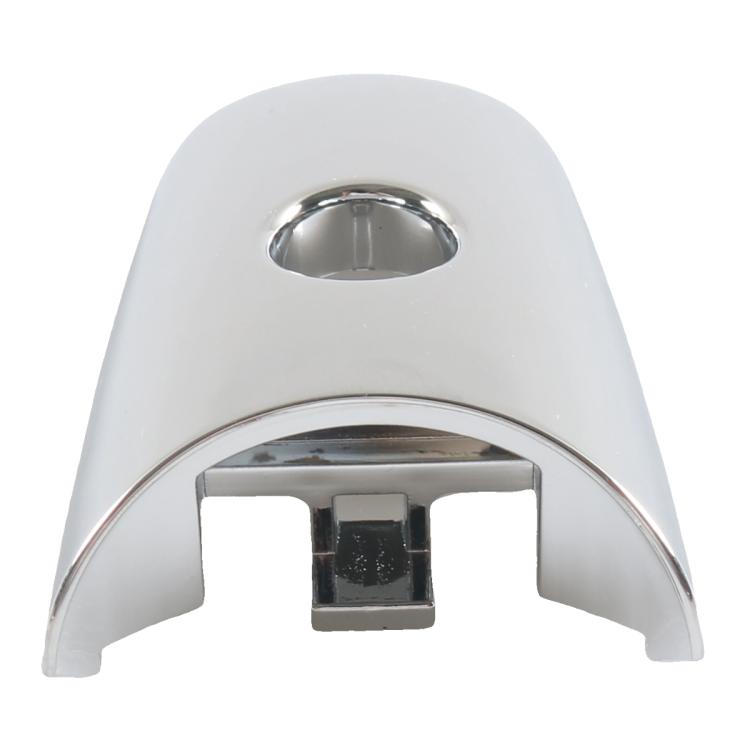 Chrome door handle cap cover with oval recess and mounting clips, close-up view