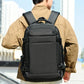 Black laptop backpack worn on back with padded straps and front organizer pocket