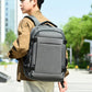 Gray business laptop backpack with front zip pockets and padded shoulder straps
