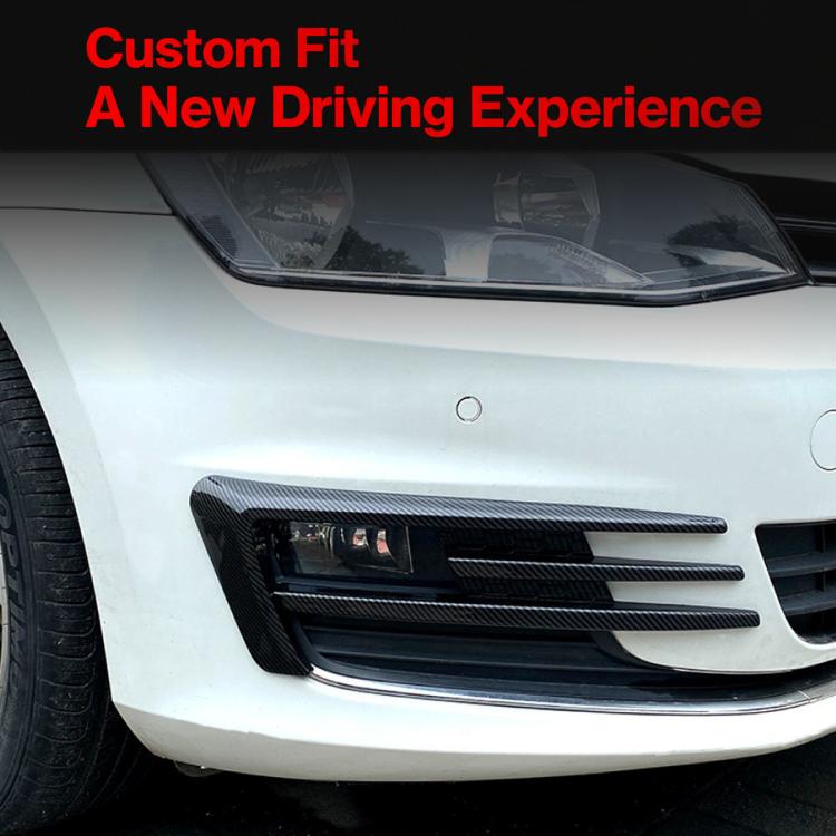Carbon-fiber fog light air knife trim on front bumper, slatted insert detail