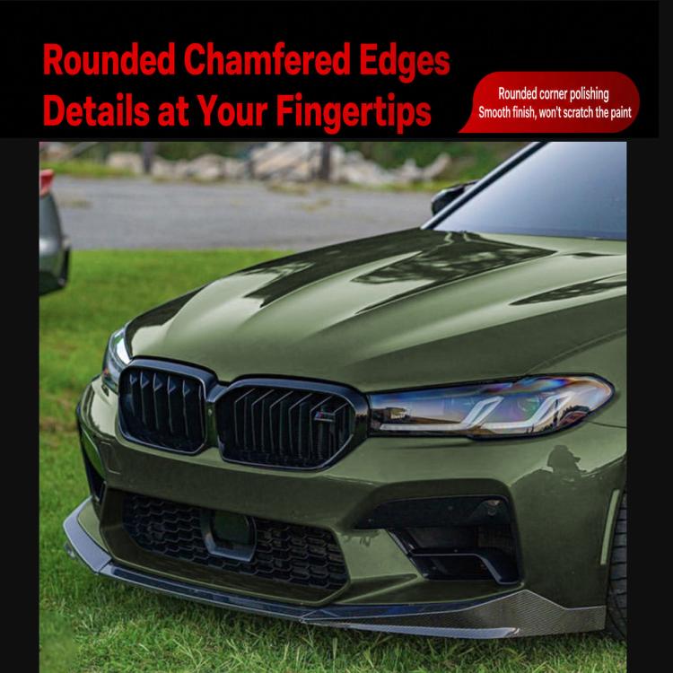 Installed black front lip spoiler on a green car front bumper