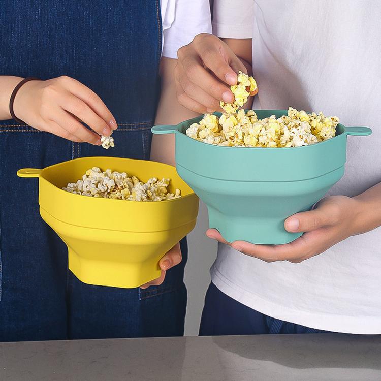 Collapsible silicone microwave popcorn popper bowl set, teal and yellow with popcorn