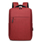 Red laptop backpack with top handle, front zipper pocket, and padded shoulder straps