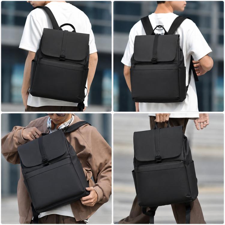 Black laptop backpack worn on back with top flap front buckle closure