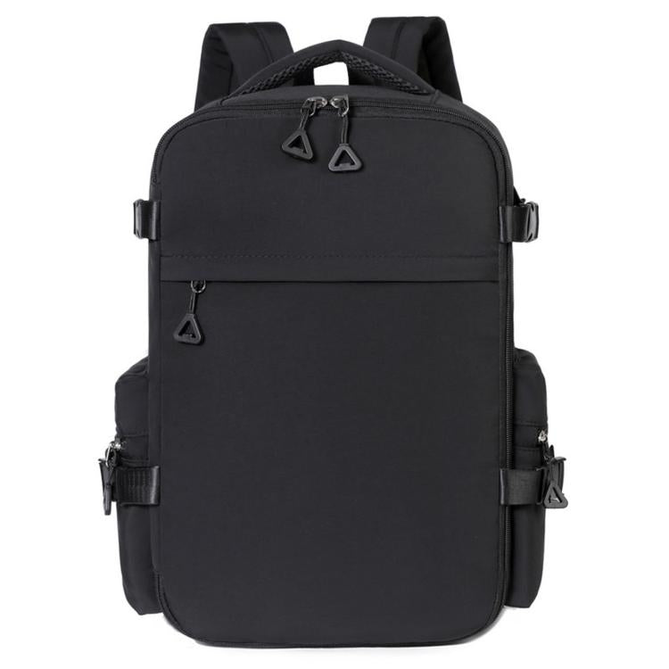 Black travel backpack with front zip pocket, side buckles, and padded shoulder straps.