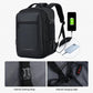 Black travel laptop backpack with USB charging port and internal cable, with shoulder strap.