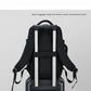 Black rear luggage strap backpack with reinforced handle and carry straps.