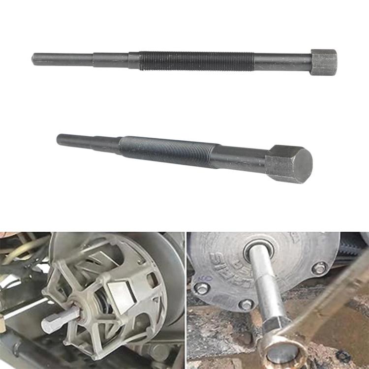 Clutch puller tool fitted near engine clutch area; hex end and threaded rod visible