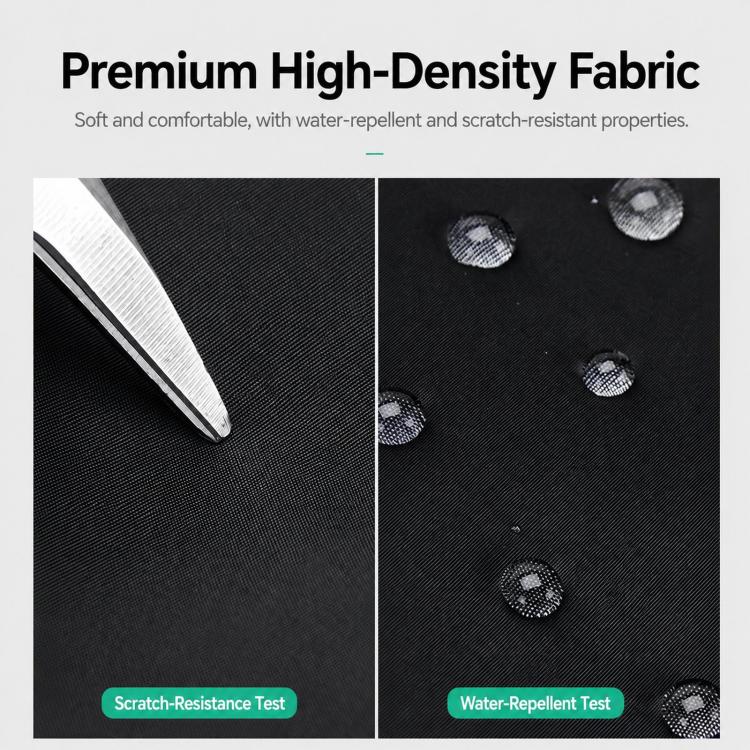 Black laptop backpack fabric close-up with water-repellent dotted texture and reinforced weave.