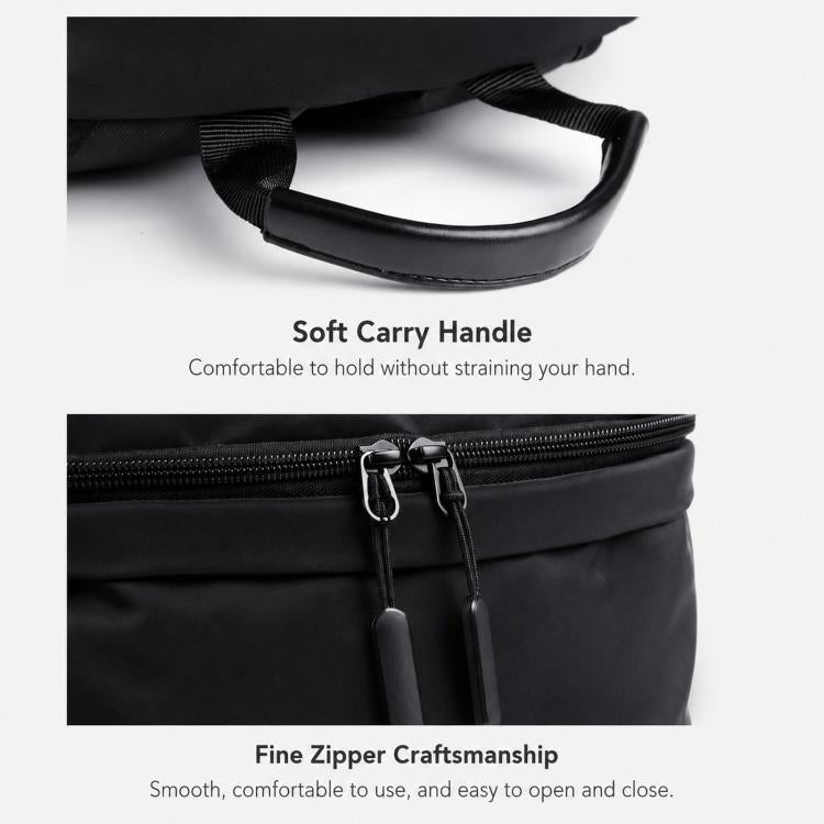 Black laptop backpack with soft carry handle and smooth front zipper detailing.