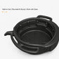 Black oil drain tray with round basin, raised rim, and loop handle openings