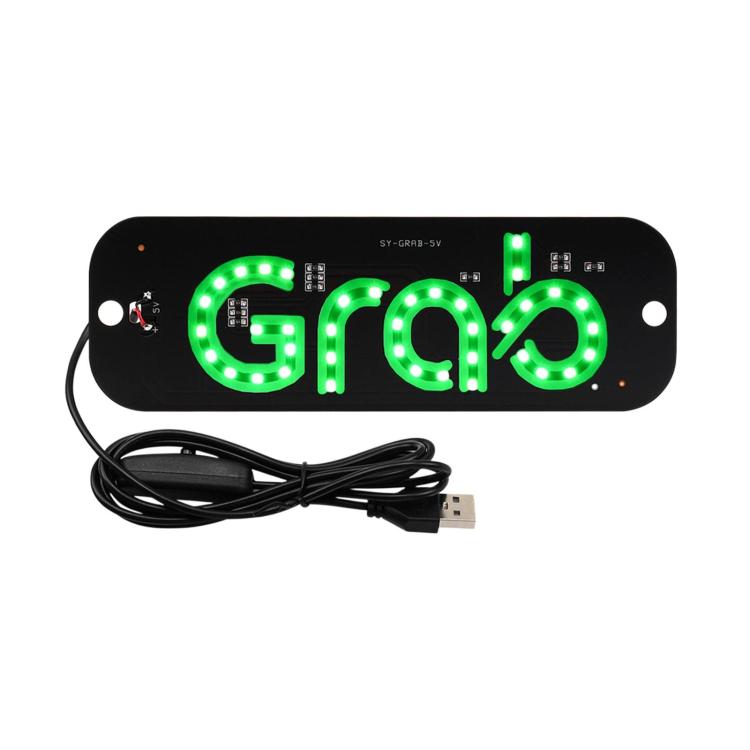 Black LED taxi sign light with green 'GRAB' letters and USB cable