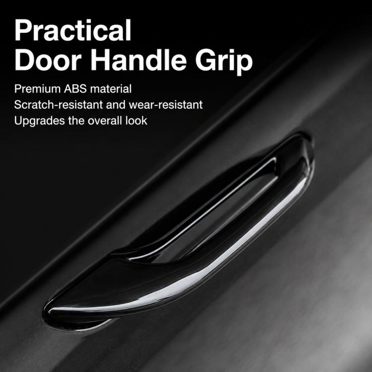 Glossy black door handle grip trim with curved recessed design