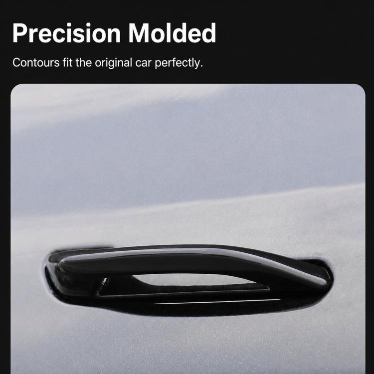 Black door handle grip trim, close-up of glossy oval contour