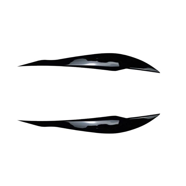 Black headlight eyebrow decal pair with sleek curved design for BMW 3 Series F30/F31