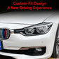 Installed headlight eyebrow decals on BMW front headlamp with dark curved edge trim