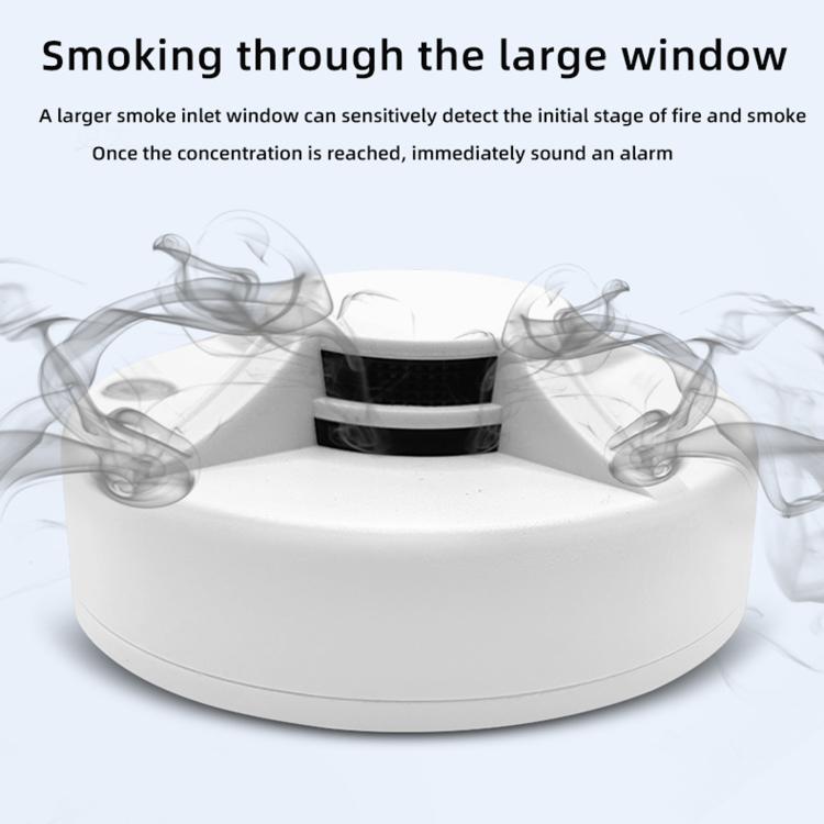 White smoke alarm with vented top, with simulated smoke cloud around it
