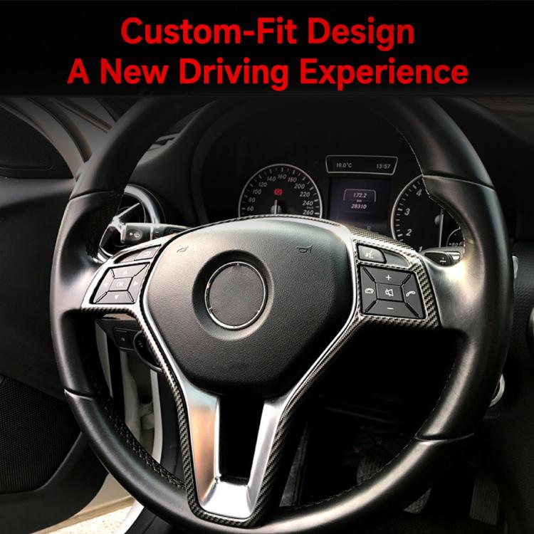 Steering wheel trim decal installed, silver accent frames around steering controls