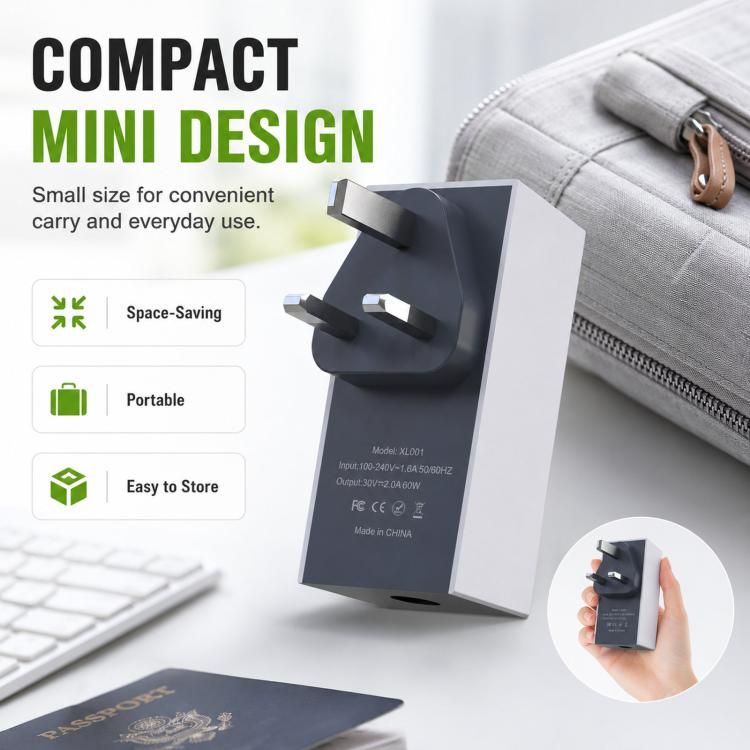Compact mini UK power adapter, black and gray with fold-out wall prongs