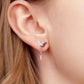 Butterfly stud teardrop crystal drop earrings with linked tassel on model ear