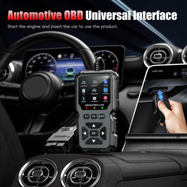 Black universal OBD2 scanner positioned in front of steering wheel with connector