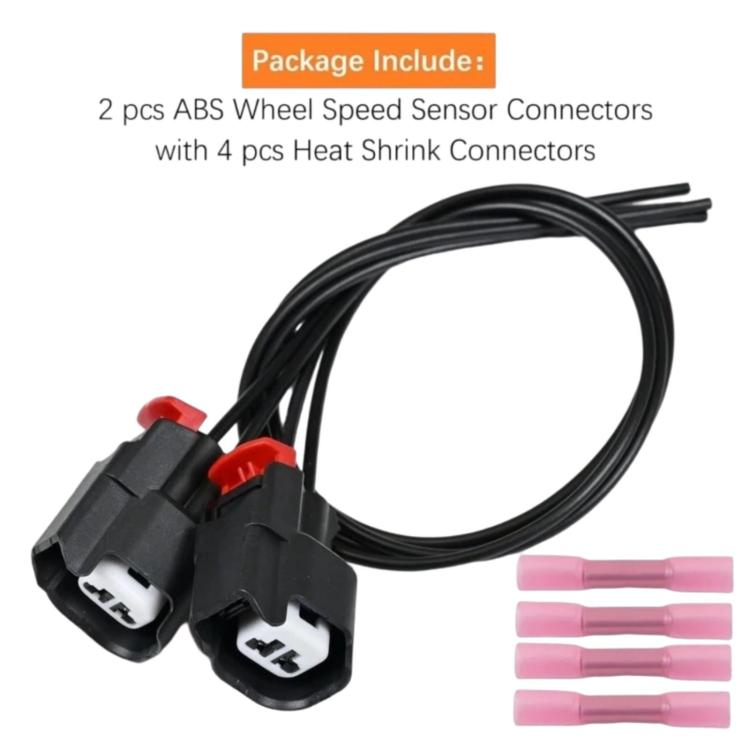 Wheel speed sensor connector pair with black wire leads and four pink heat-shrink connectors
