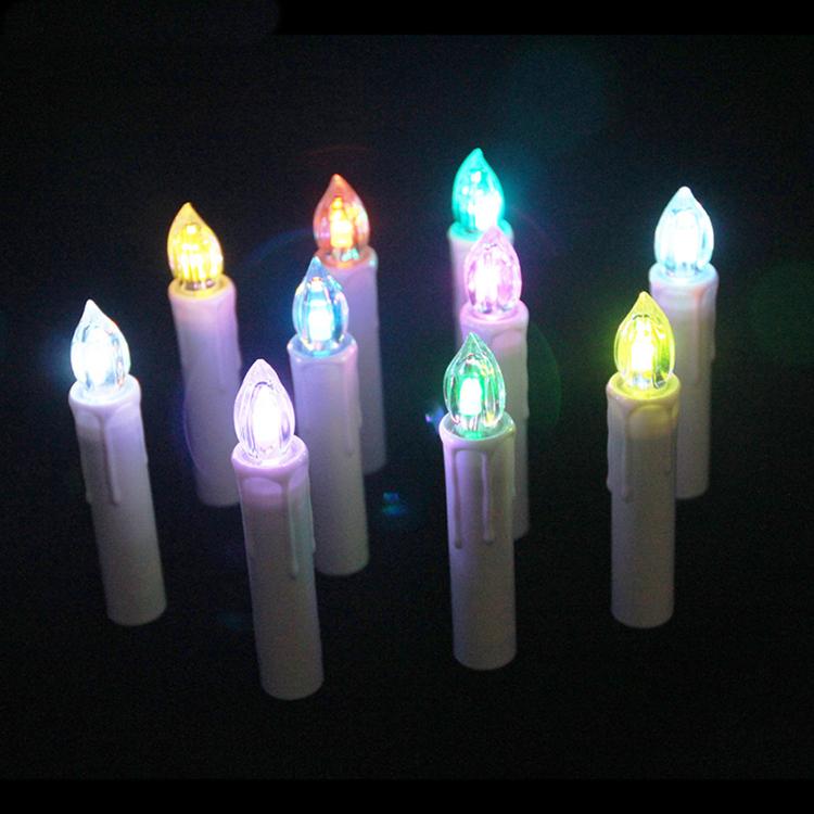 Set of LED candle lights with multicolor glowing flame tips and black clip bases