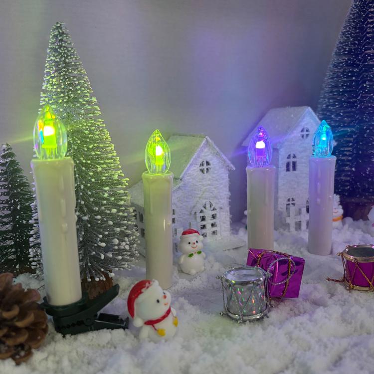 LED candle lights with multicolor flames in a festive winter scene