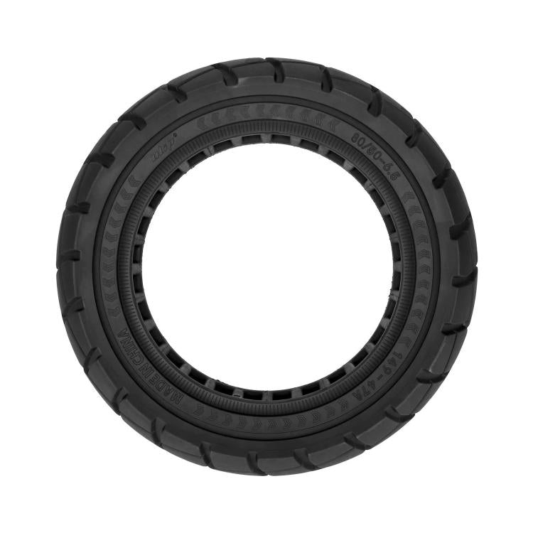 Black solid scooter tire with circular tread and inner mounting ring, angled view