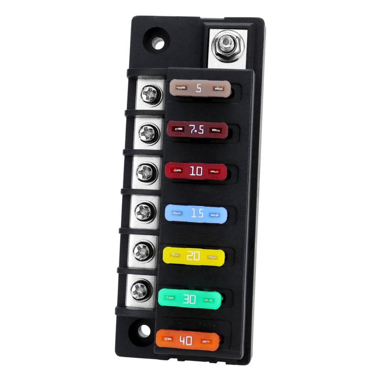 Blade fuse holder panel with six labeled fuse slots and metal mounting points