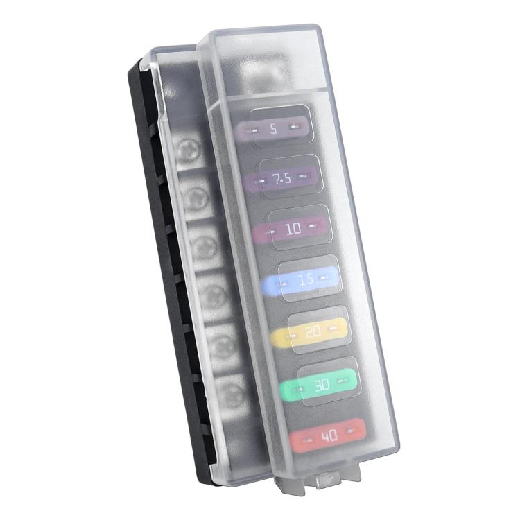 Transparent-covered blade fuse holder showing six colored fuse indicators