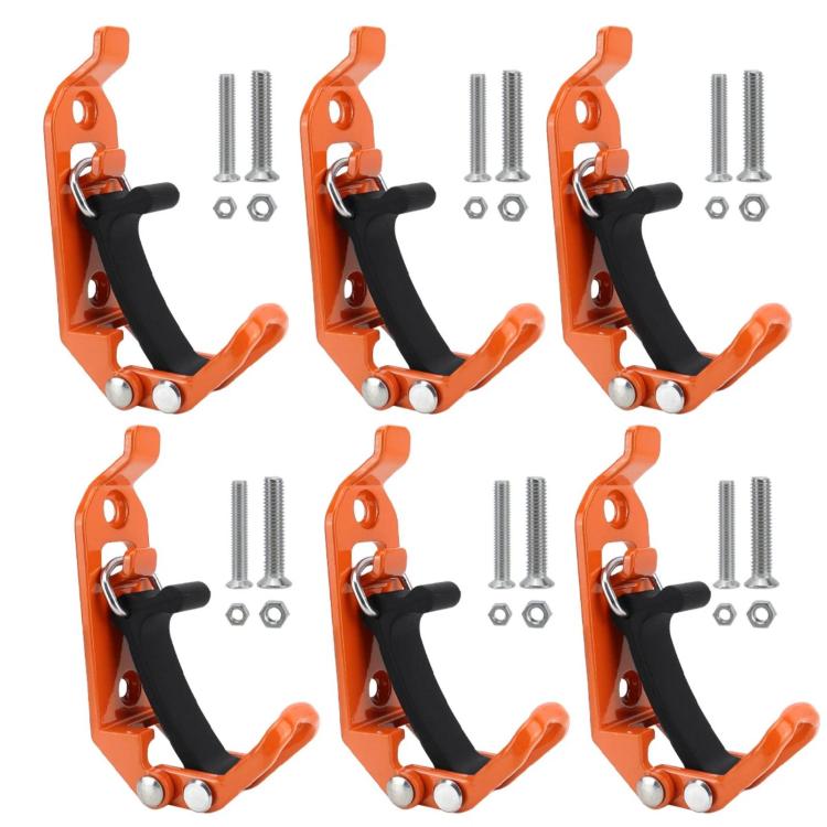 Orange roof rack fixing clamps with black straps, shown in multiple pairs with hardware