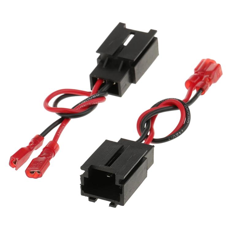 Car audio speaker wiring harness with two black connector blocks and red plug leads