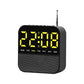 Black digital LED alarm clock radio with yellow time display and day-of-week lights