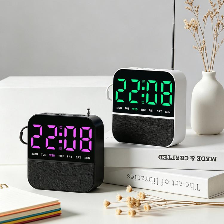 Two LED alarm clock radios: one green, one pink/purple time display with day lights