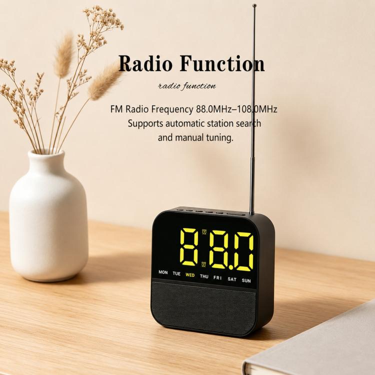 Black LED alarm clock radio on wood: yellow time display with day-of-week lights