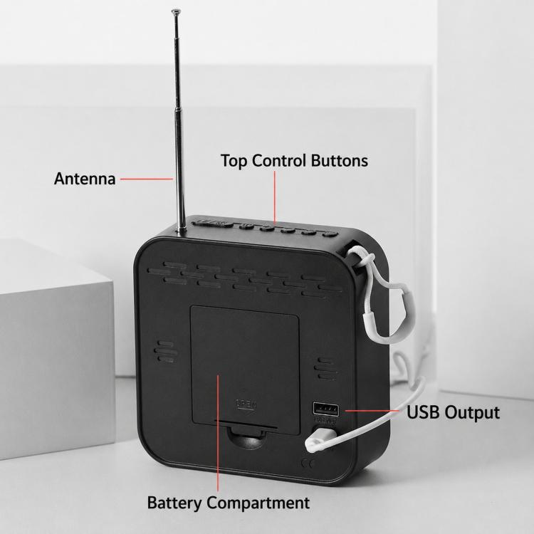 Digital alarm clock back panel with antenna, USB output, and battery compartment