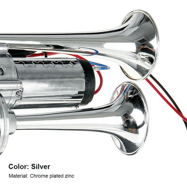 Silver chrome-plated zinc double electric horn, close-up of twin trumpet mouths