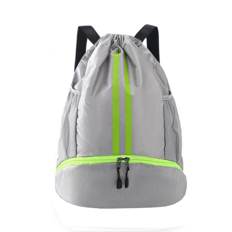 Grey drawstring sports backpack with neon green stripe and separate lower shoe compartment