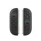 Black wireless game controller with gray side rails and dual thumbsticks