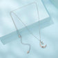 Star and moon pendant necklace with crescent charm and small star, silver-tone chain