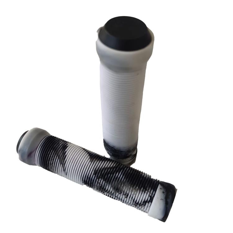 White bike handlebar grips with textured anti-slip pattern and end caps