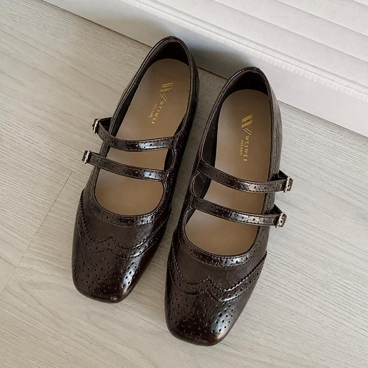 Women’s dark brown flat ballet shoes with ankle straps and decorative perforation detailing