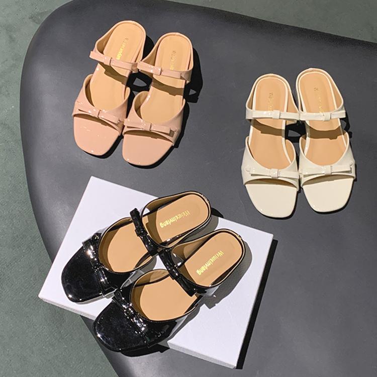 Square-toe slide sandals in black, white, and blush with single strap