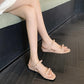Nude blush square-toe slide sandals with one strap, worn by model