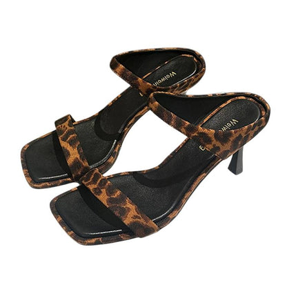 Leopard square-toe slide heeled sandals with one wide strap, black accents