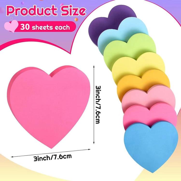 Heart-shaped sticky notes in pink and multicolor stacks for memo writing