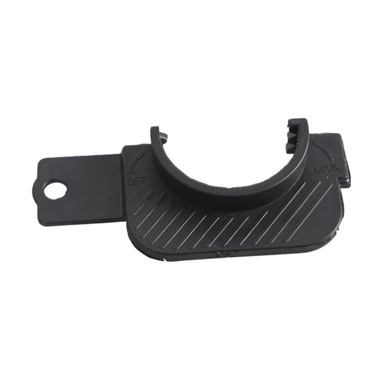 Black fuel door bracket with OFF and LOCK molded marks, curved opening, and mount holes