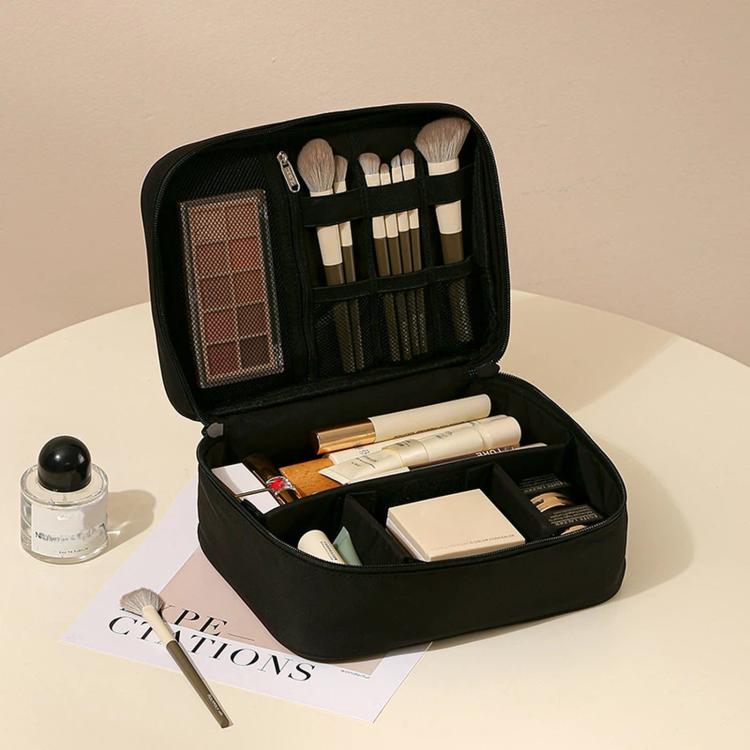 Black single-layer makeup organizer bag with adjustable dividers and brush holder slots