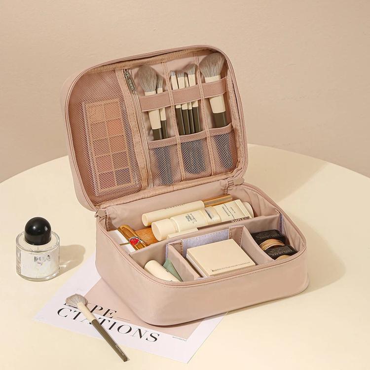 Pink makeup bag organizer with zip-top, mesh divider pocket, and brush holder slots